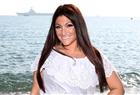 Deena Nicole Cortese poses during a photocall for her reality show Jersey Shore at the MIPTV, on April 1, 2012 in Cannes, on the French Riviera.